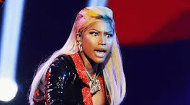 Nicki Minaj looking upset on stage