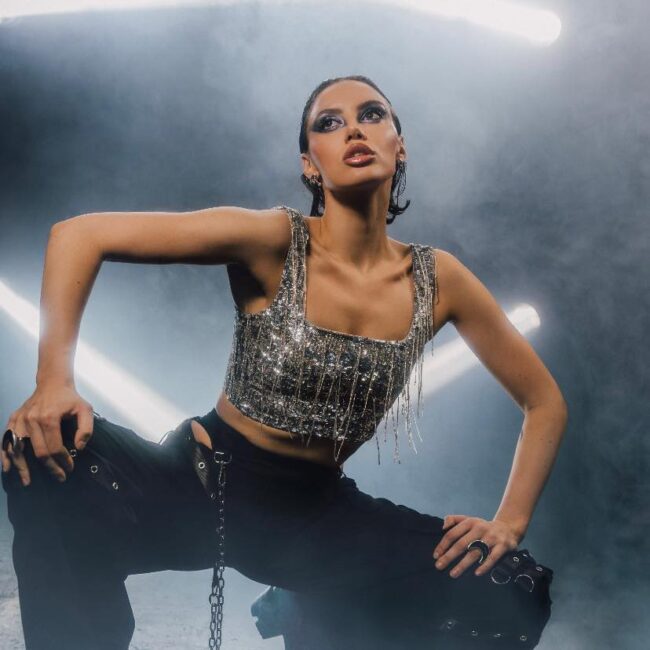 Sarah Landry poses on stage